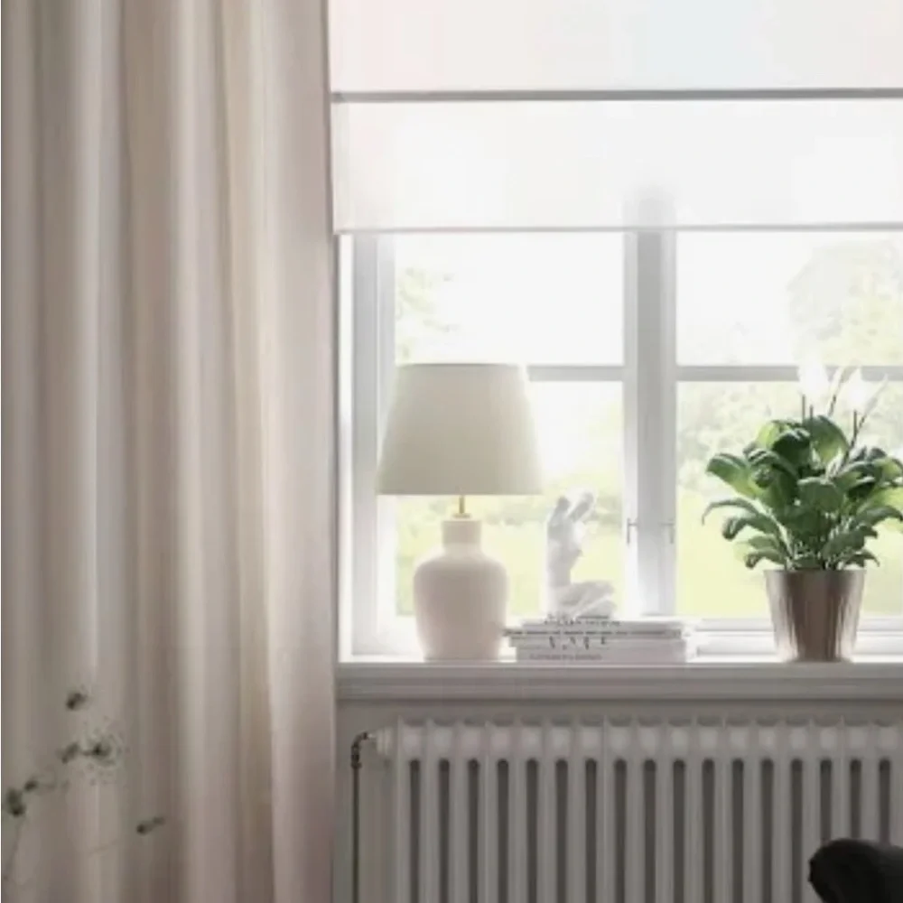 2 IKEA LENDA cream tab top curtain panels